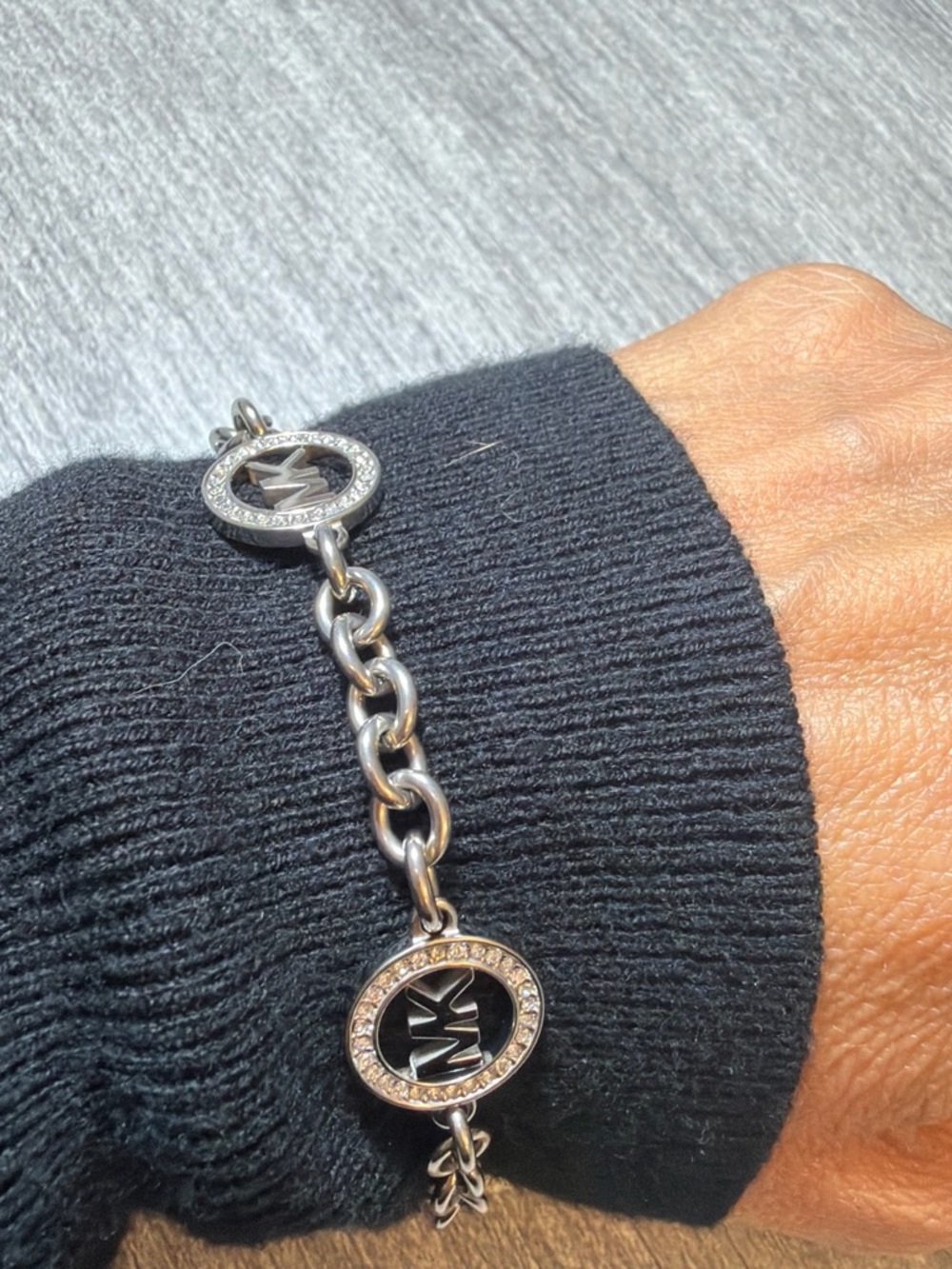 Michael Kors Silver-Tone MK Charm Chain Bracelet with Crystal Rings